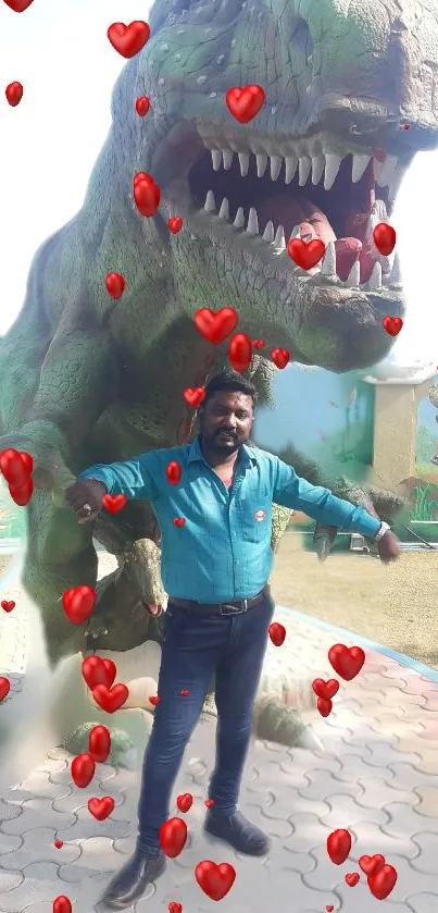 Man posing in front of a dinosaur surrounded by floating heart symbols.