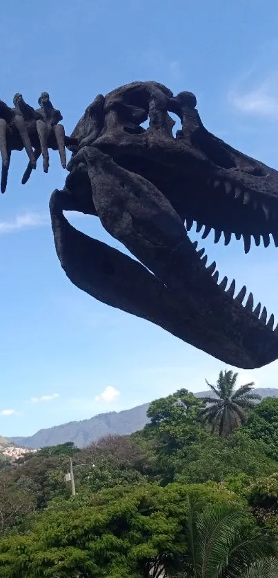 Dinosaur skeleton with lush scenery and blue sky backdrop.