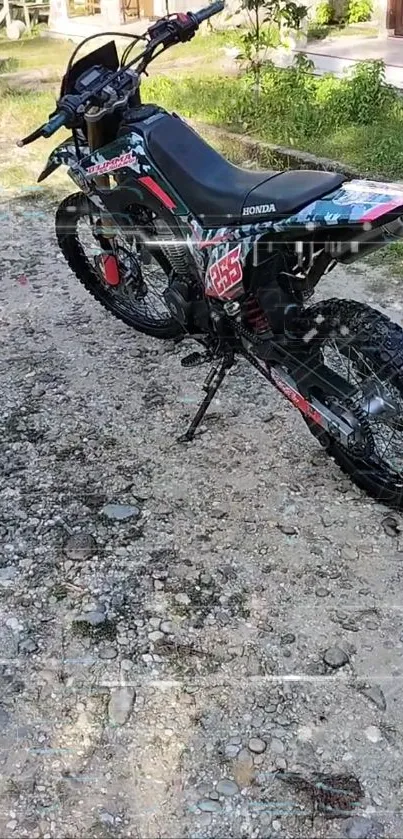 A dirt bike on a rocky trail, perfect for adventure.