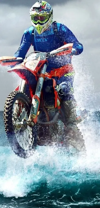 Dirt bike rider jumps through ocean waves in an exhilarating scene.