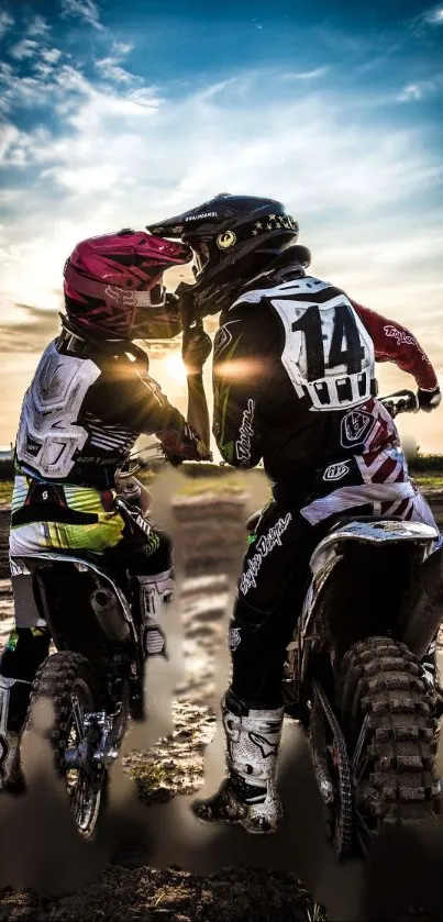 Motocross riders at sunset in dynamic pose.