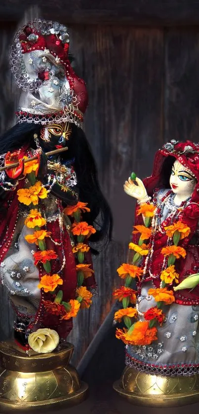 Vibrant deity figures with colorful garlands.