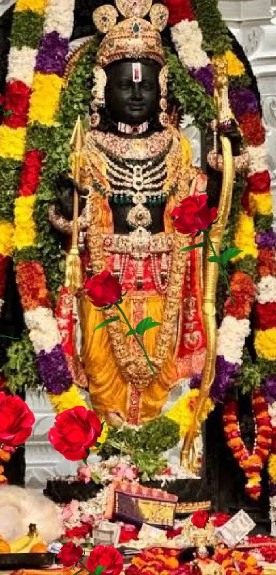 Divine deity adorned with colorful garlands and roses set in a temple background.