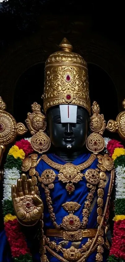 Divine statue in ornate attire with vibrant colors