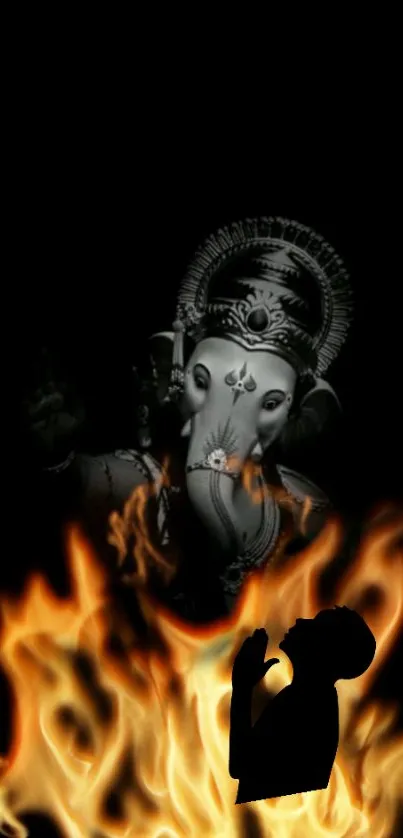 Ganesh silhouette with fiery background, symbolizing spirituality and power.