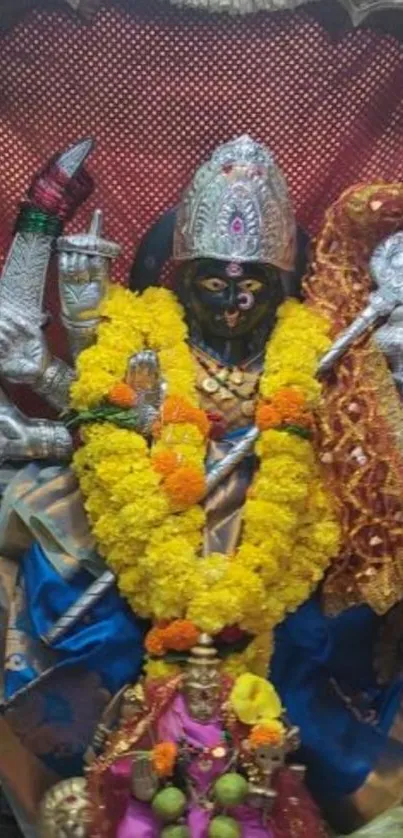 Vibrant image of Goddess Durga adorned with garlands and bright decorations.