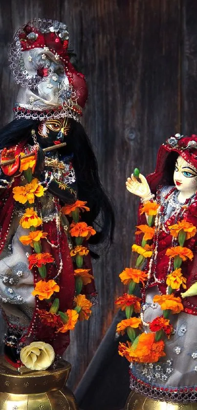 Beautiful Krishna and Radha adorned in vibrant garlands on a phone wallpaper.