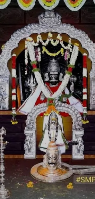 Vibrant Lord Shiva temple idol with floral garlands