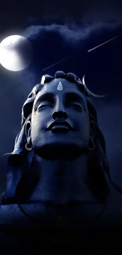 Moonlit Lord Shiva statue with a serene night sky.