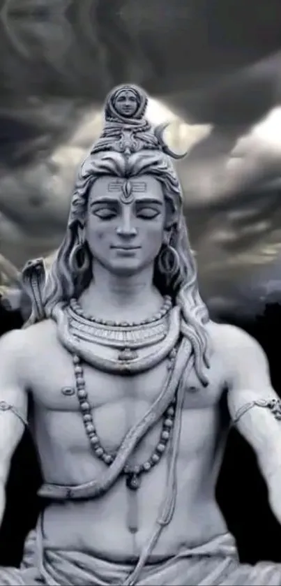 Monochrome image of Lord Shiva meditating under a dramatic sky.