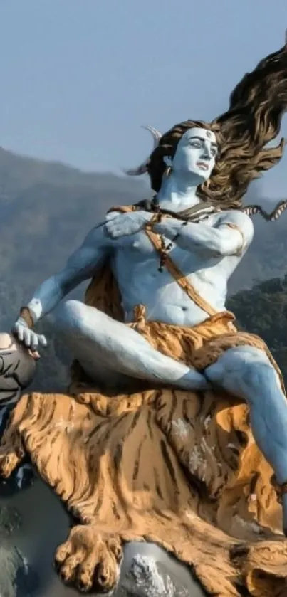 Mobile wallpaper featuring Lord Shiva statue in nature setting.