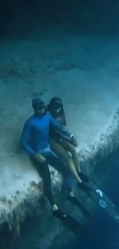 A serene underwater scene with two scuba divers exploring the deep blue ocean.