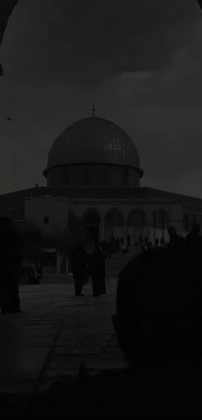 Dome of the Rock silhouette under a cloudy sky.