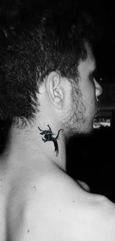 Monochrome dragon tattoo on the neck in a striking black and white design.