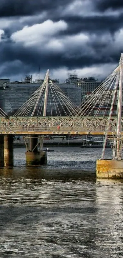 Dramatic bridge with stormy sky above river.