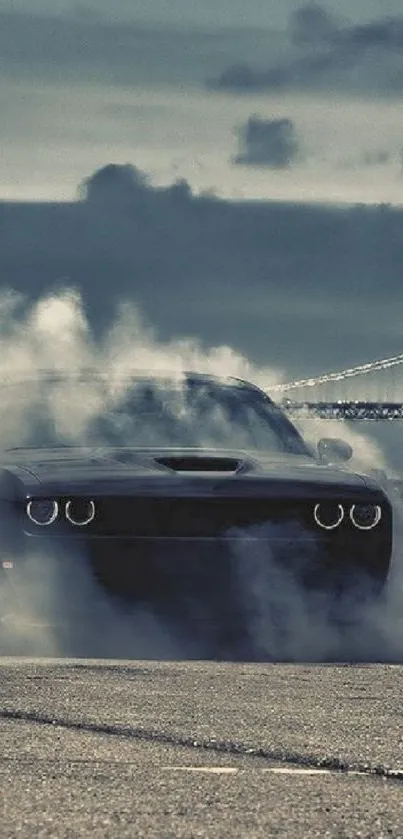 Car drifting with dramatic smoke against a dark cloudy sky.