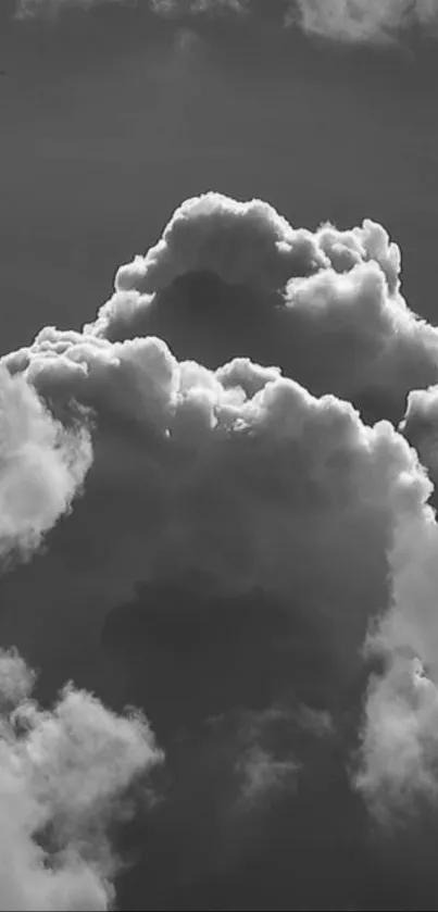 Black and white dramatic cloudscape wallpaper for mobile.