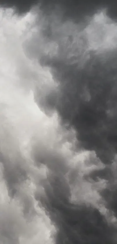 Dramatic clouds in a dark, stormy sky for a mobile wallpaper background.