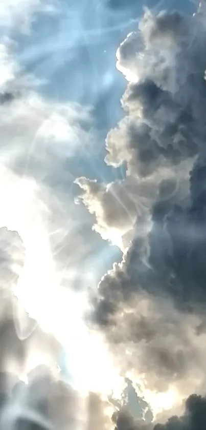 Dramatic clouds with sunlight peeking through, perfect for mobile wallpaper.