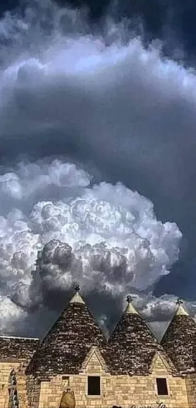 Dramatic dark blue sky with cloud formation over a stone building.