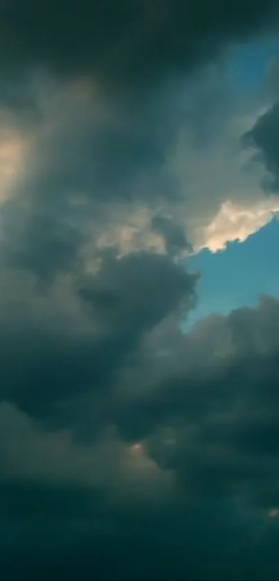 Dramatic cloudy sky with hints of sunlight.