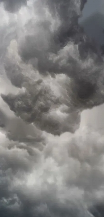 Dramatic cloudy sky with dark storm clouds.