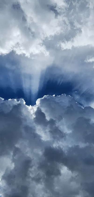 Wallpaper with dramatic clouds against a vibrant blue sky.