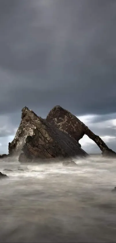 Dramatic stormy coastal landscape with rock formations.