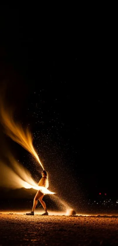 Person performing fire dance in darkness with vibrant flames.