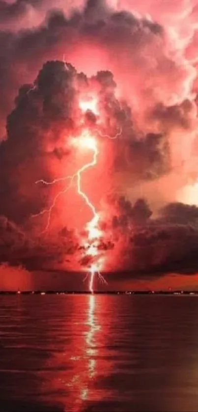 Dramatic red lightning strikes through dark clouds over water.