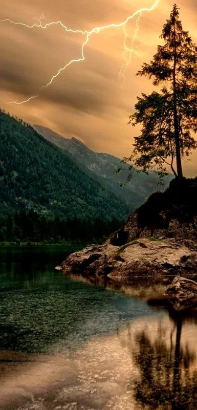 Lightning over mountain landscape with a lone tree and serene water reflection.