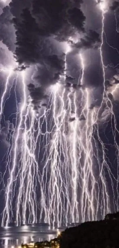 Dynamic lightning storm over ocean at night.