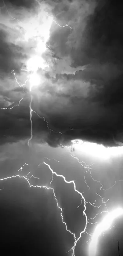 Black and white wallpaper of a dramatic lightning storm.