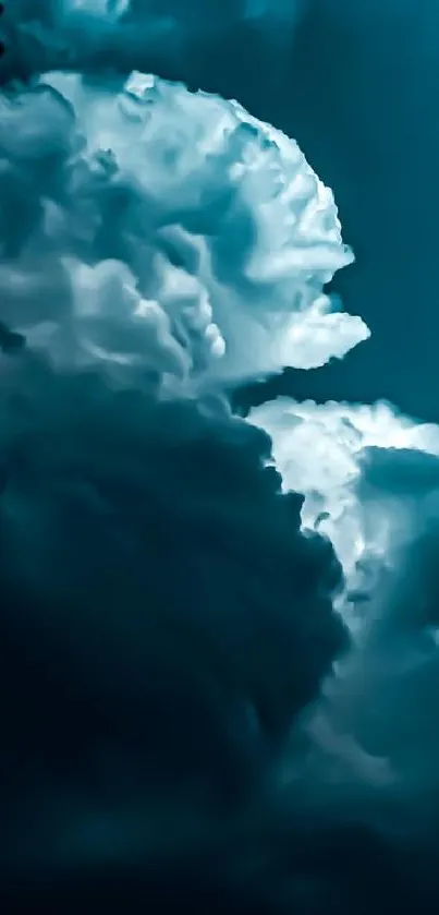 Dramatic clouds illuminated by blue light in a night sky wallpaper.