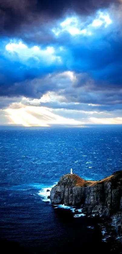 Dramatic sky over ocean and lighthouse.