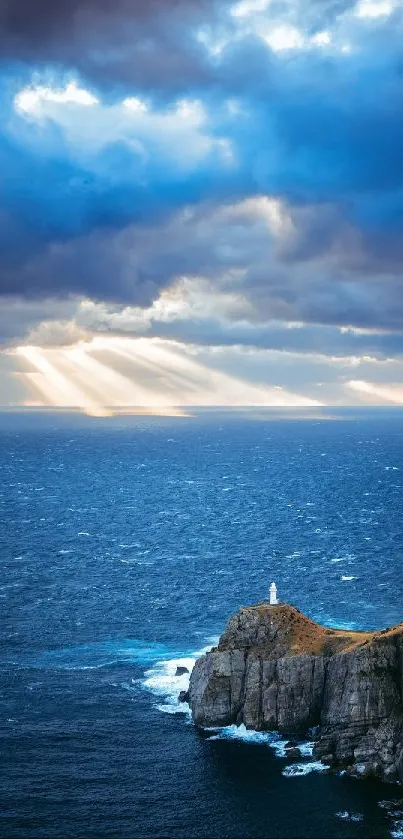 A lighthouse on a coastal cliff with dramatic ocean and sky scenery.