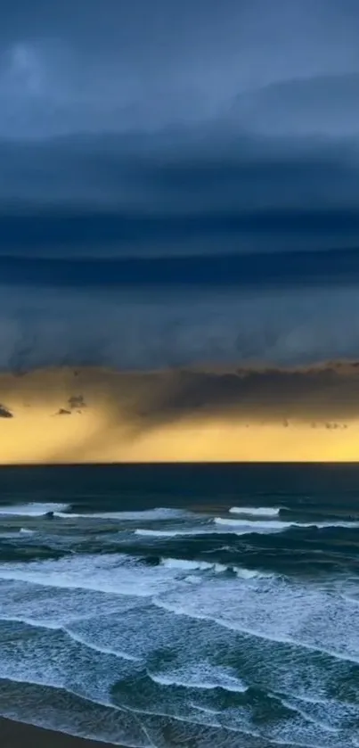 A dramatic ocean sunset with dark stormy clouds and vibrant gold horizon.