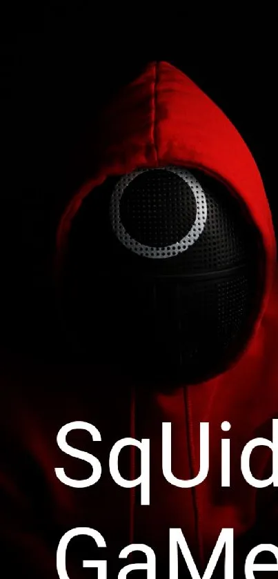 Mysterious red hooded figure on dark background wallpaper.