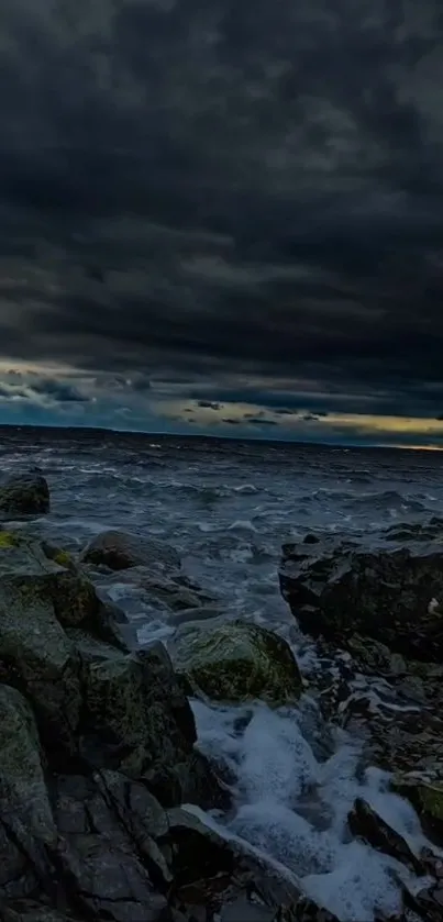 Dramatic seascape with stormy sky and rugged rocks.