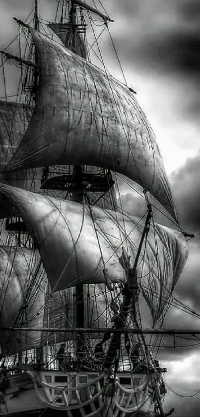 Vintage sailing ship against stormy gray skies.