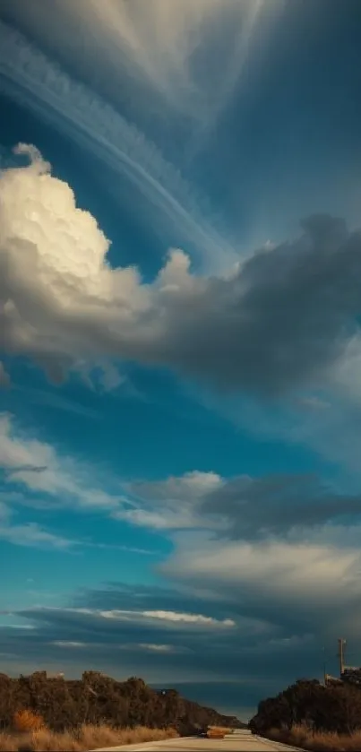 Dramatic sky with clouds over landscape, vibrant blue hues.