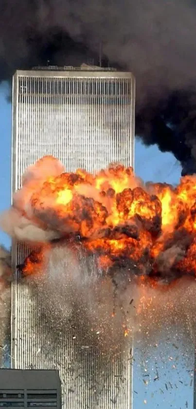 Dramatic explosion engulfing a skyscraper with smoke.