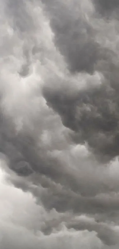 Dramatic storm clouds forming a moody and intense sky scene.