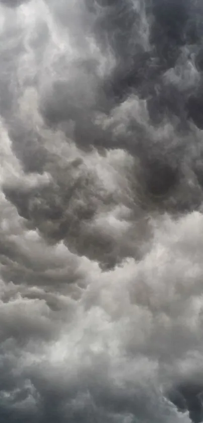 Dramatic stormy sky with dark swirling clouds.