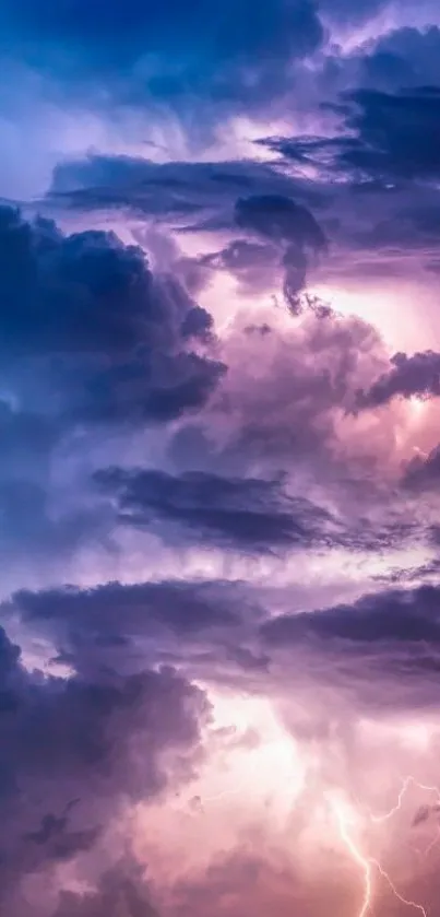 Dramatic storm clouds with lightning in a purple sky wallpaper.