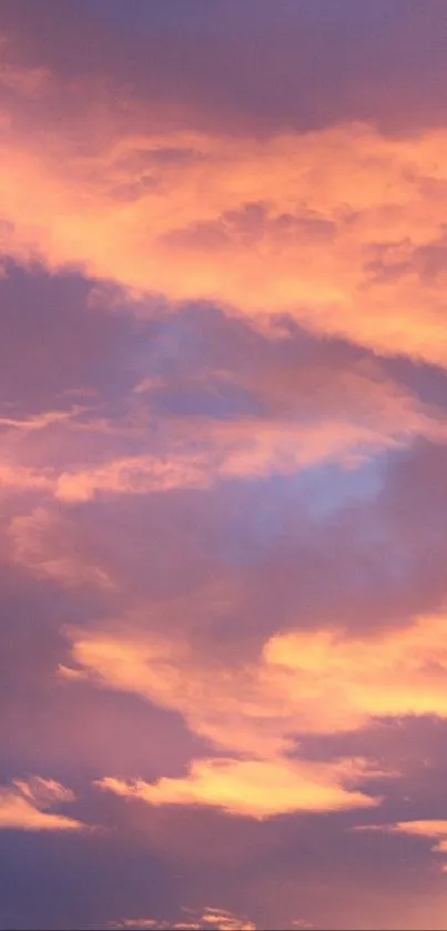 Mobile wallpaper of a dramatic sunset cloudscape in purple and orange tones.