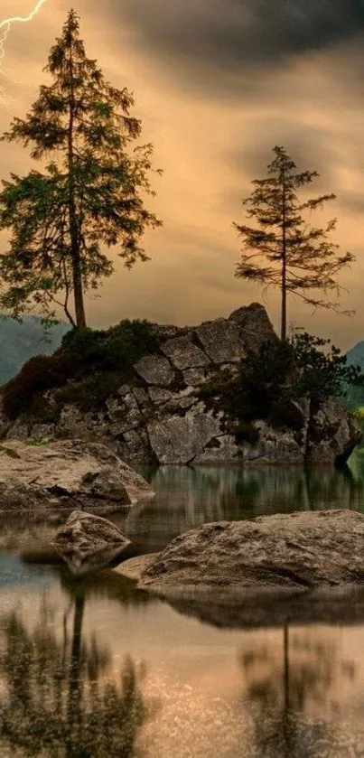 Dramatic sunset over a serene lake with trees and rocky formations.