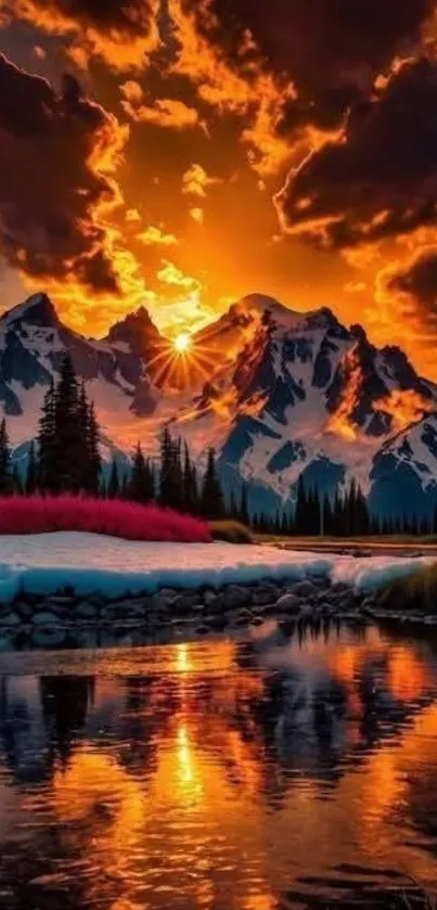Dramatic sunset over mountains with vibrant reflection on water.