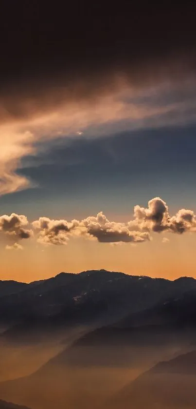 Sunset over mountains with vibrant sky and clouds, perfect as mobile wallpaper.