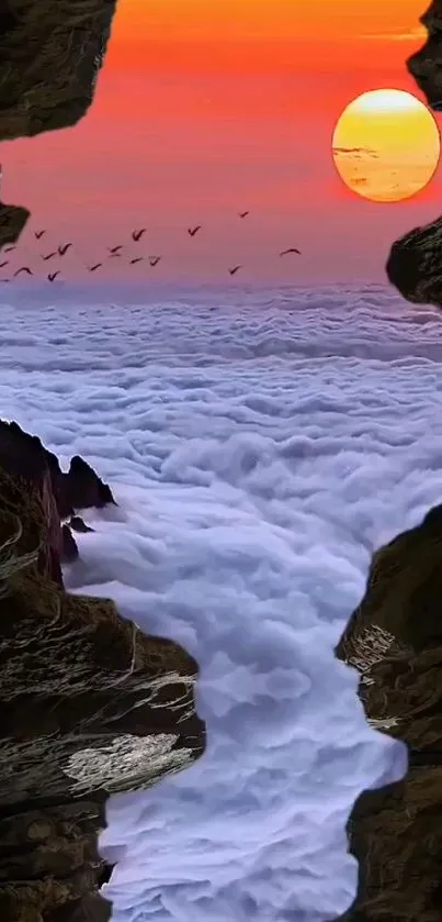 Dramatic sunset over clouds with rocky cliff frame.